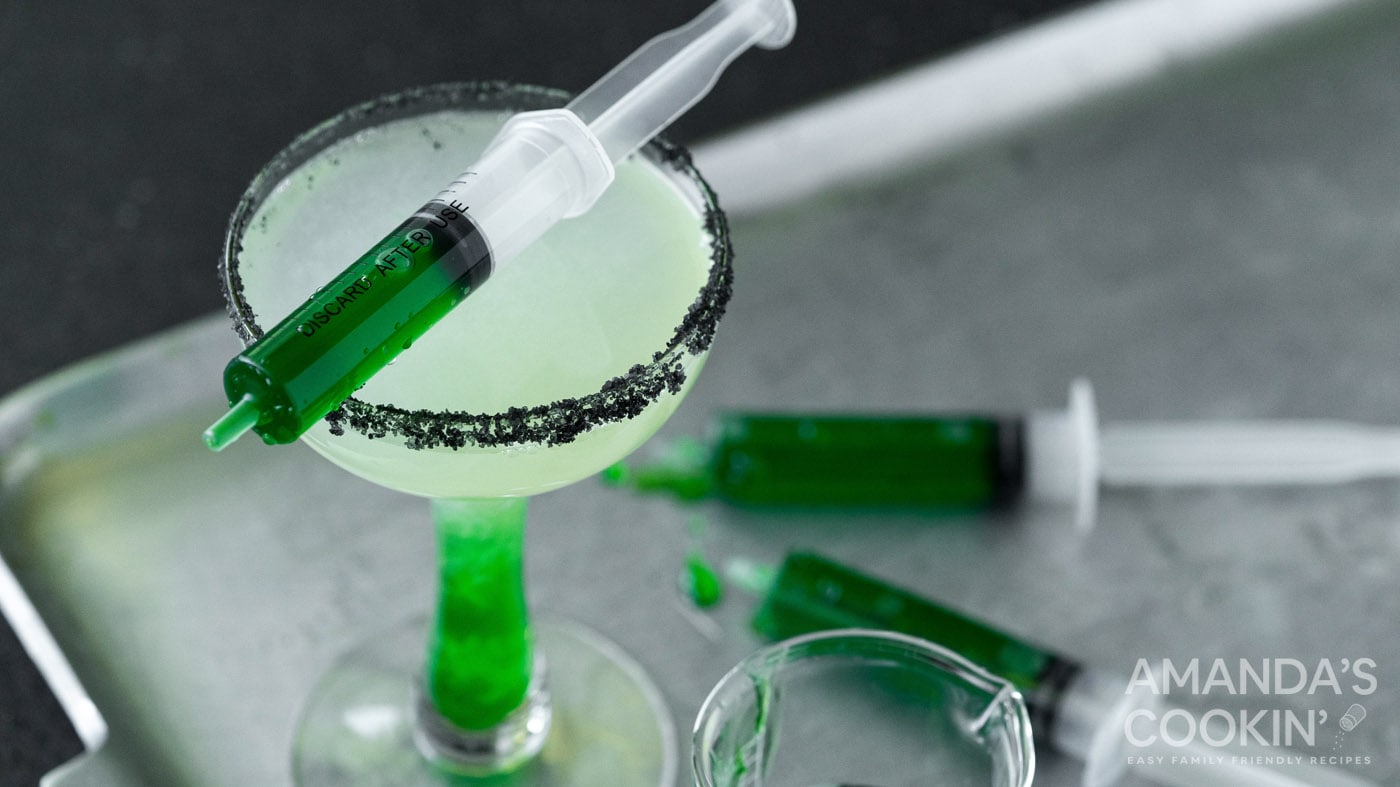 Green goo meets this refreshing Frankenstein margarita loaded with tequila and lime juice in a black