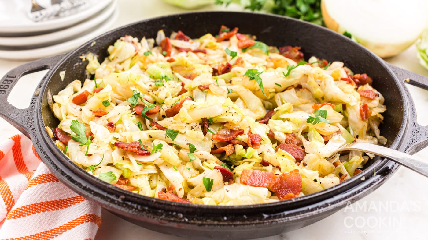 Deliciously easy fried cabbage with bacon, onions, crisp cabbage, and creole seasoning is a flavorfu