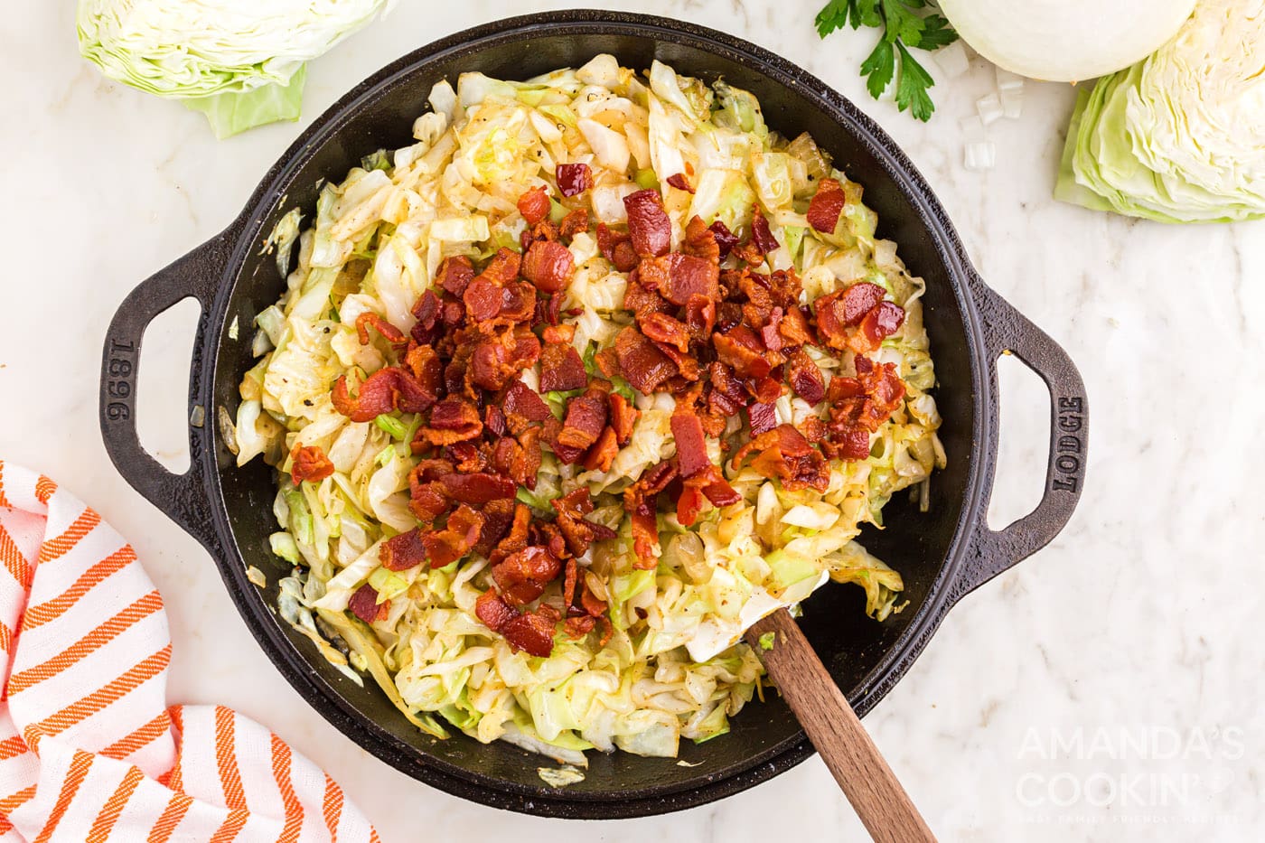 chopped bacon in a skillet with cabbage