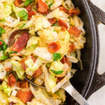 Fried Cabbage in pan with serving spoon