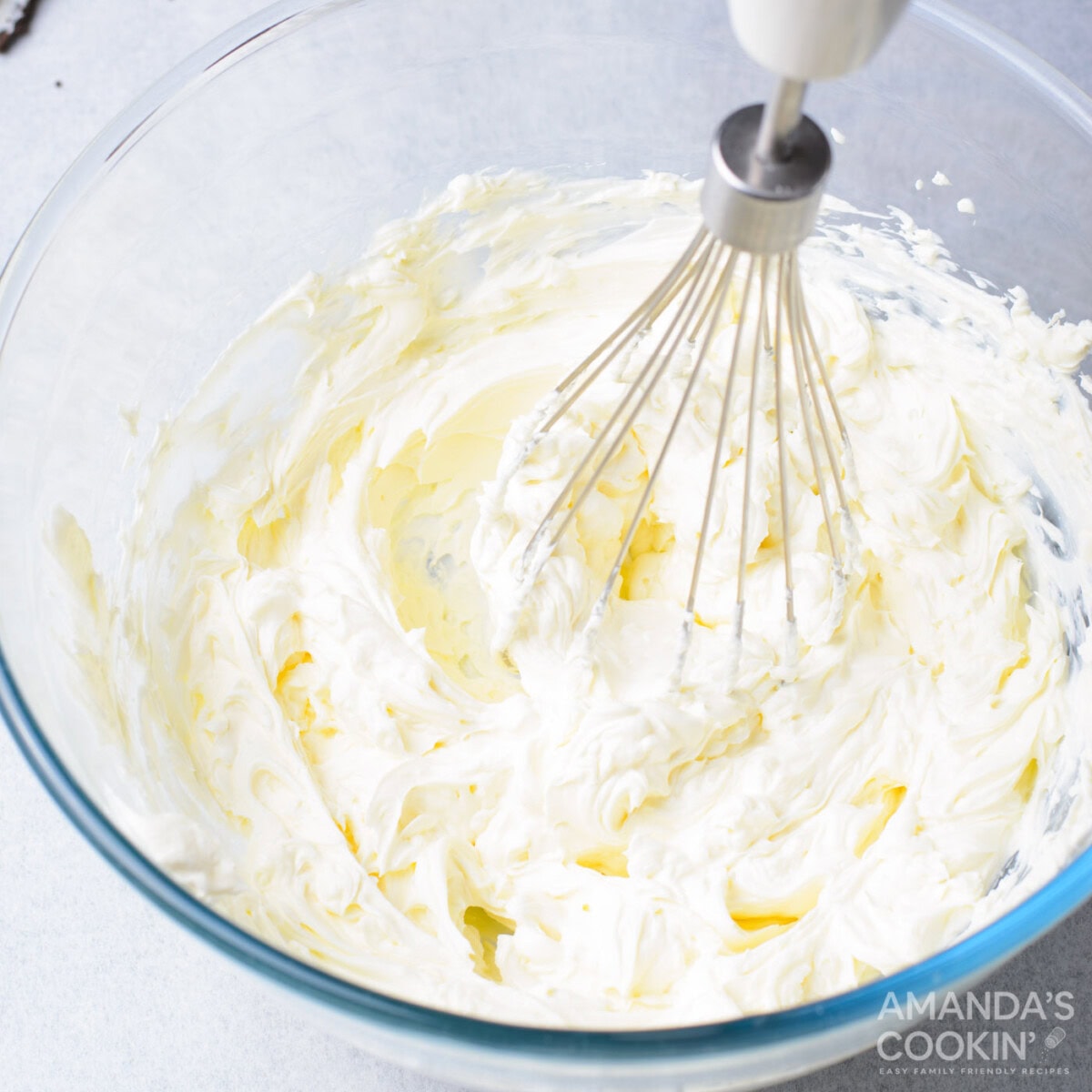 mixing cream cheese