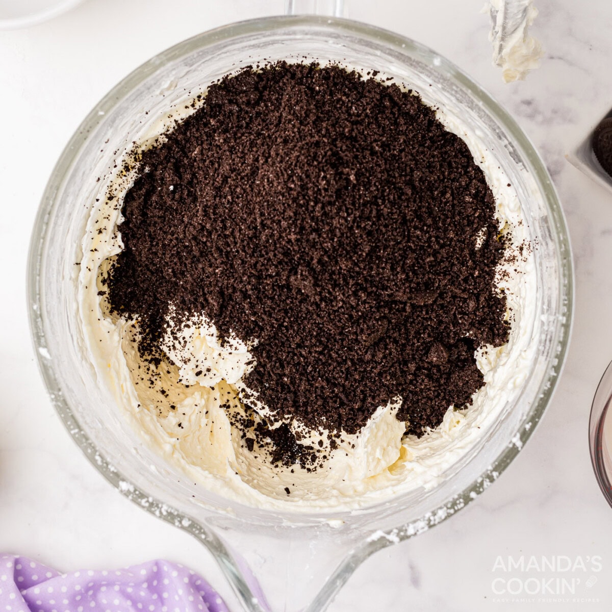 oreo crumbs in cheesecake mixture