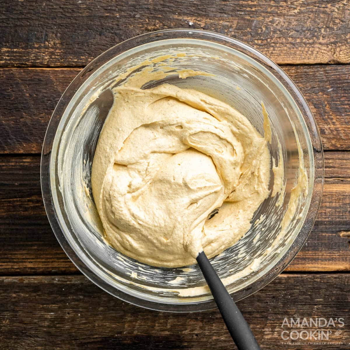 pumpkin pie dip in mixing bowl with a spoon