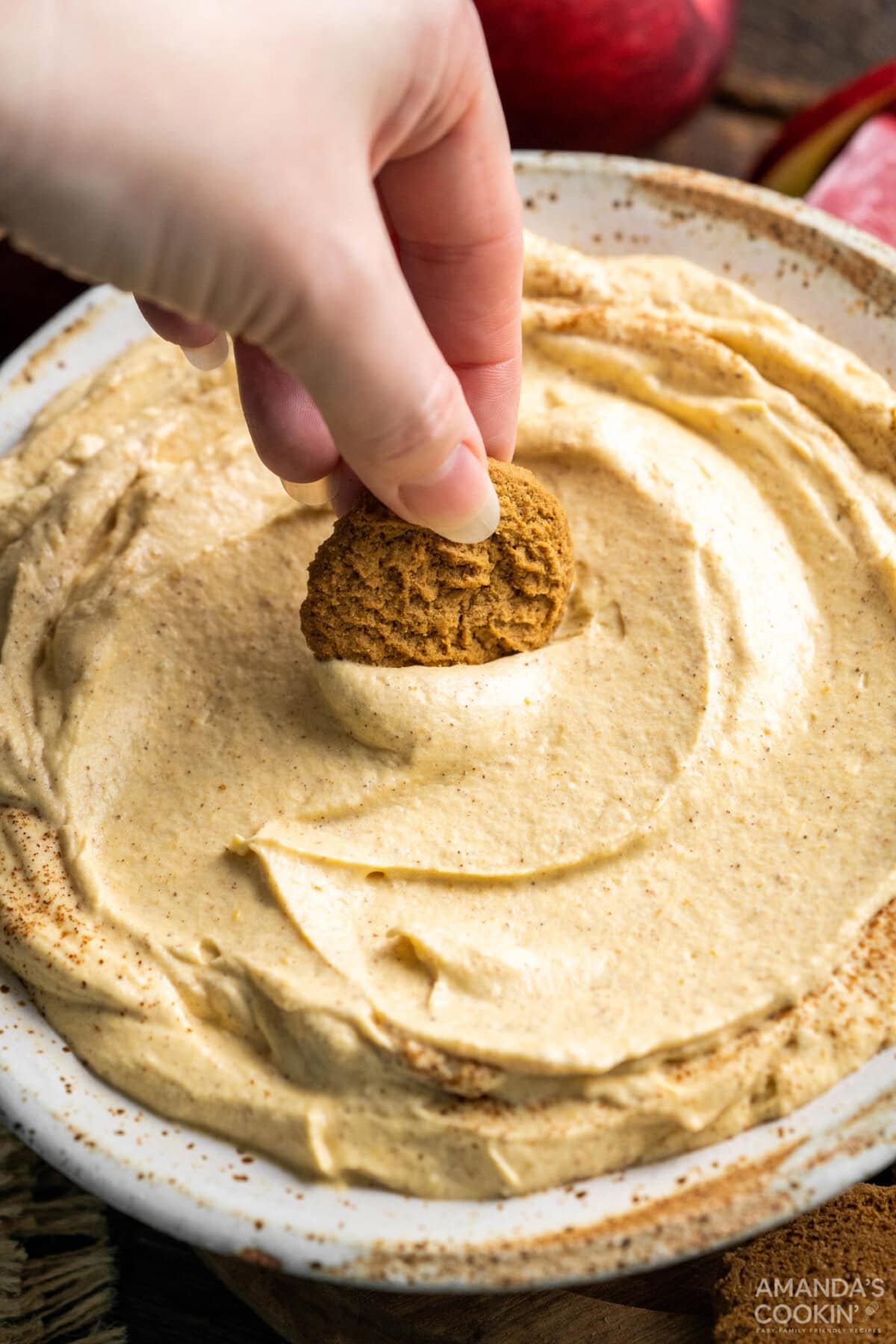 dipping cookie in Pumpkin Pie Dip