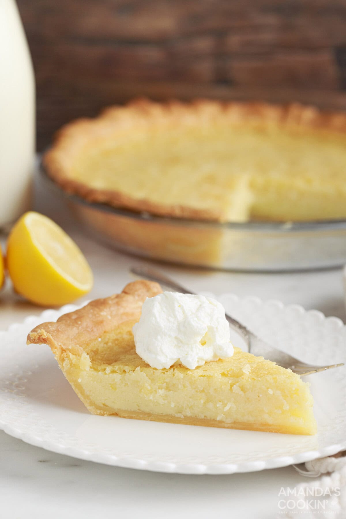 slice of Southern Buttermilk Pie with whipped cream