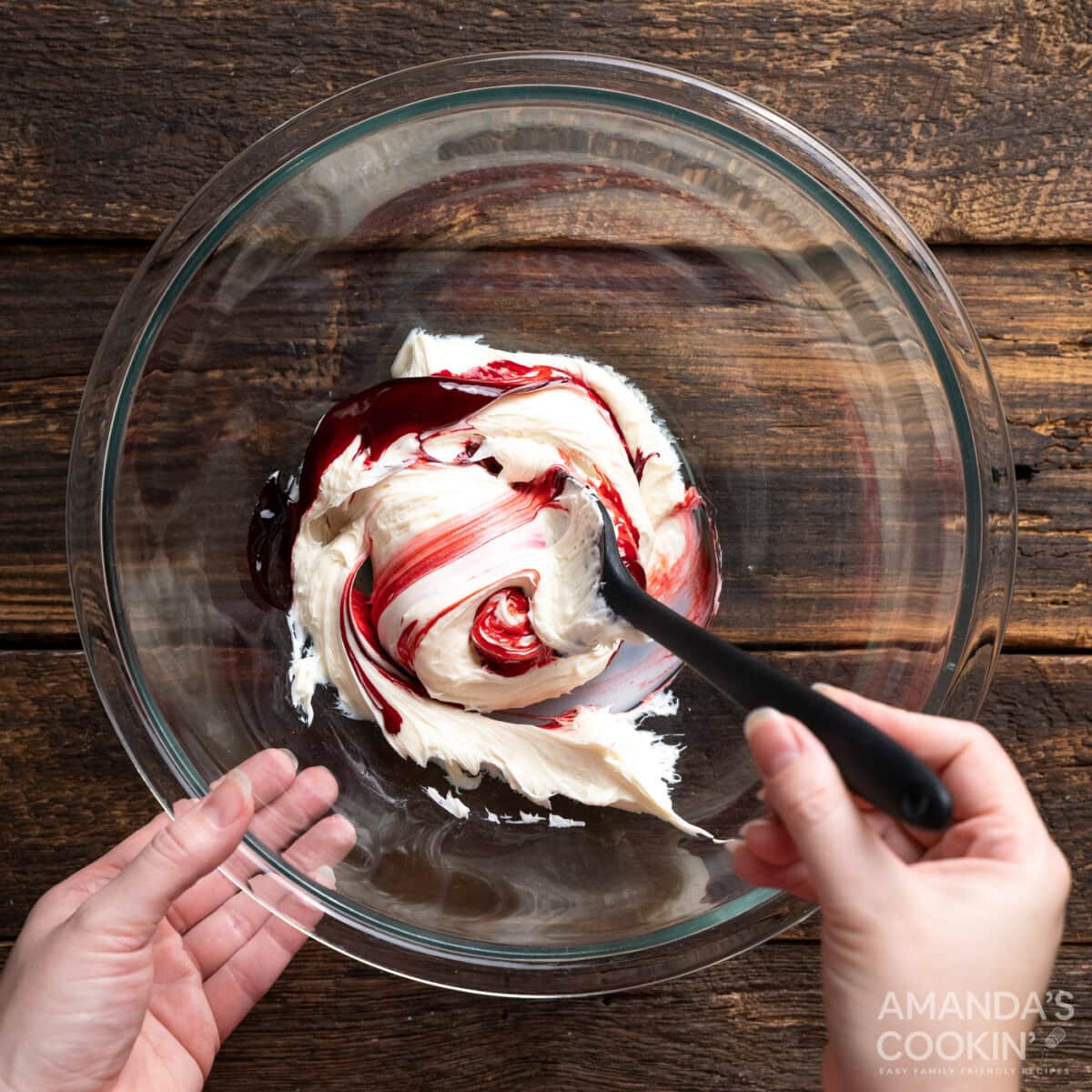 mixing food coloring into frosting