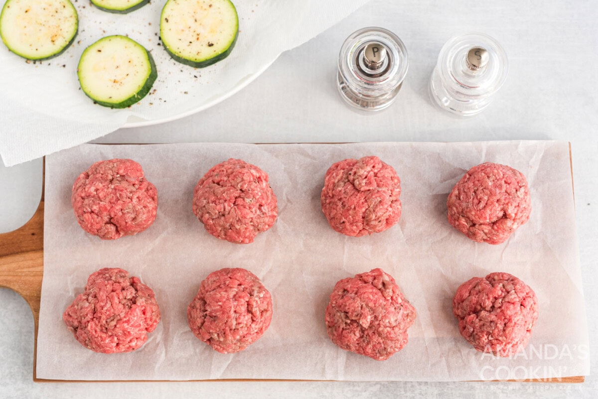 mini burger patties on parchment paper