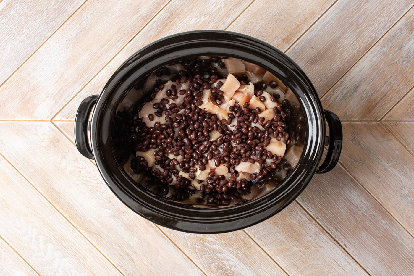 chicken and black beans in a slow cooker
