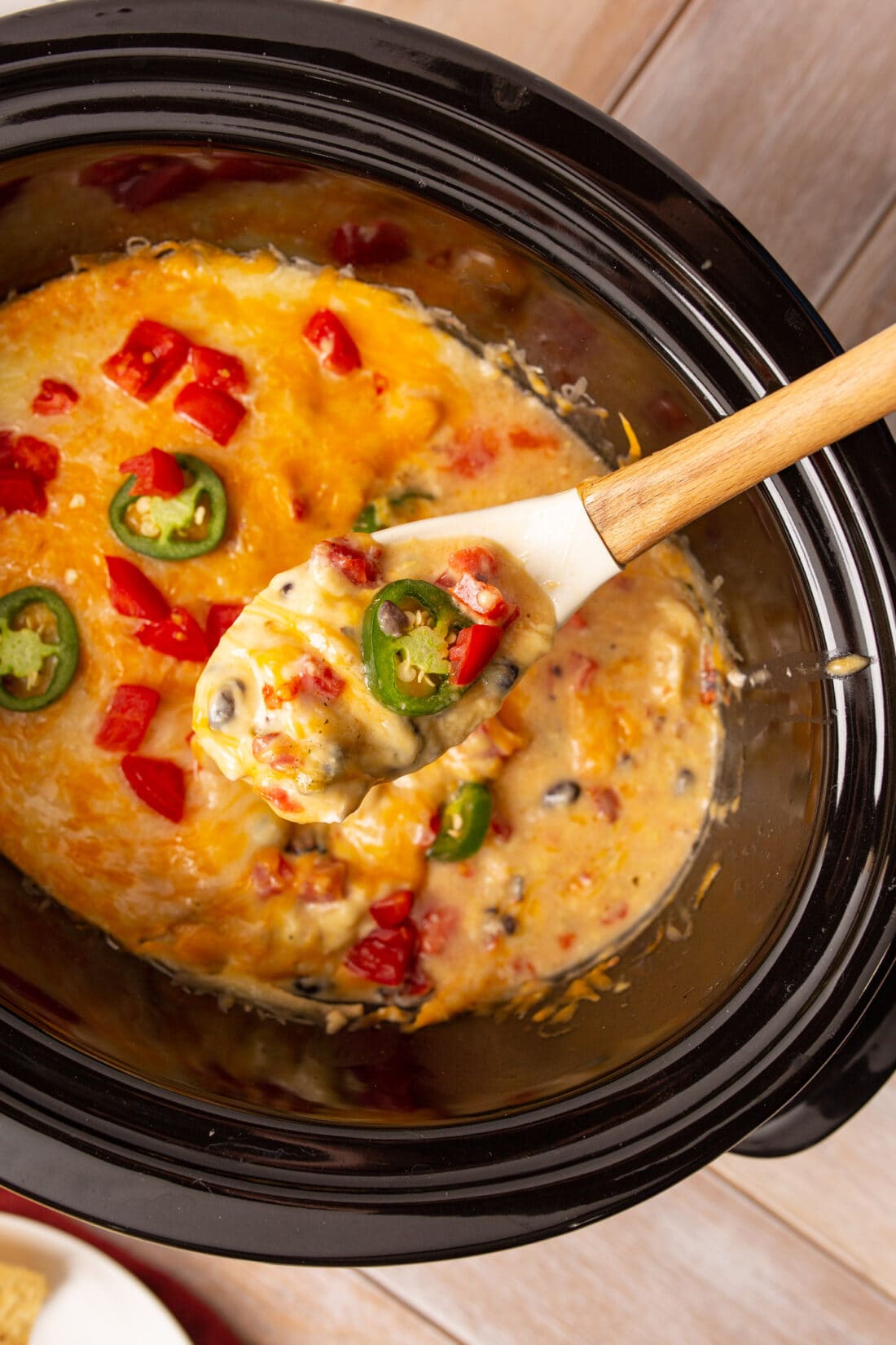 serving spoon of crockpot mexican chicken