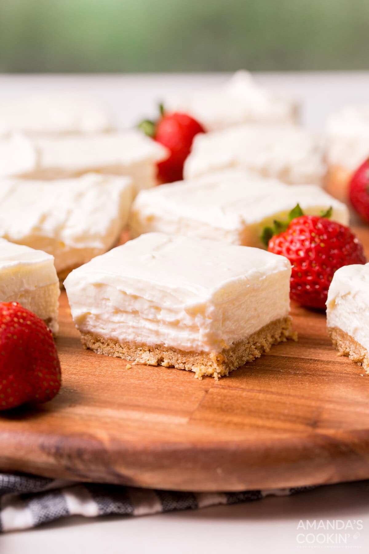 No Bake Cheesecake Bars on a cutting board