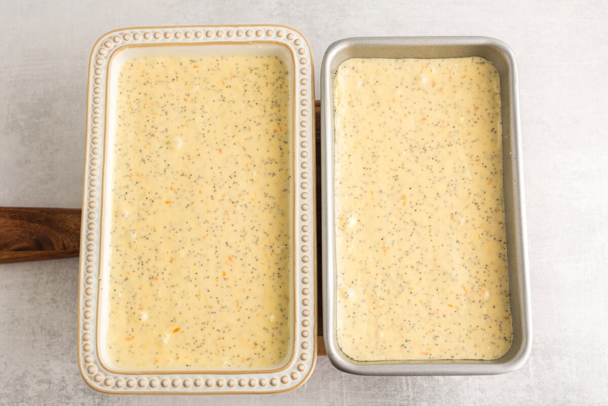 loaf pans with orange poppy seed pound cake batter