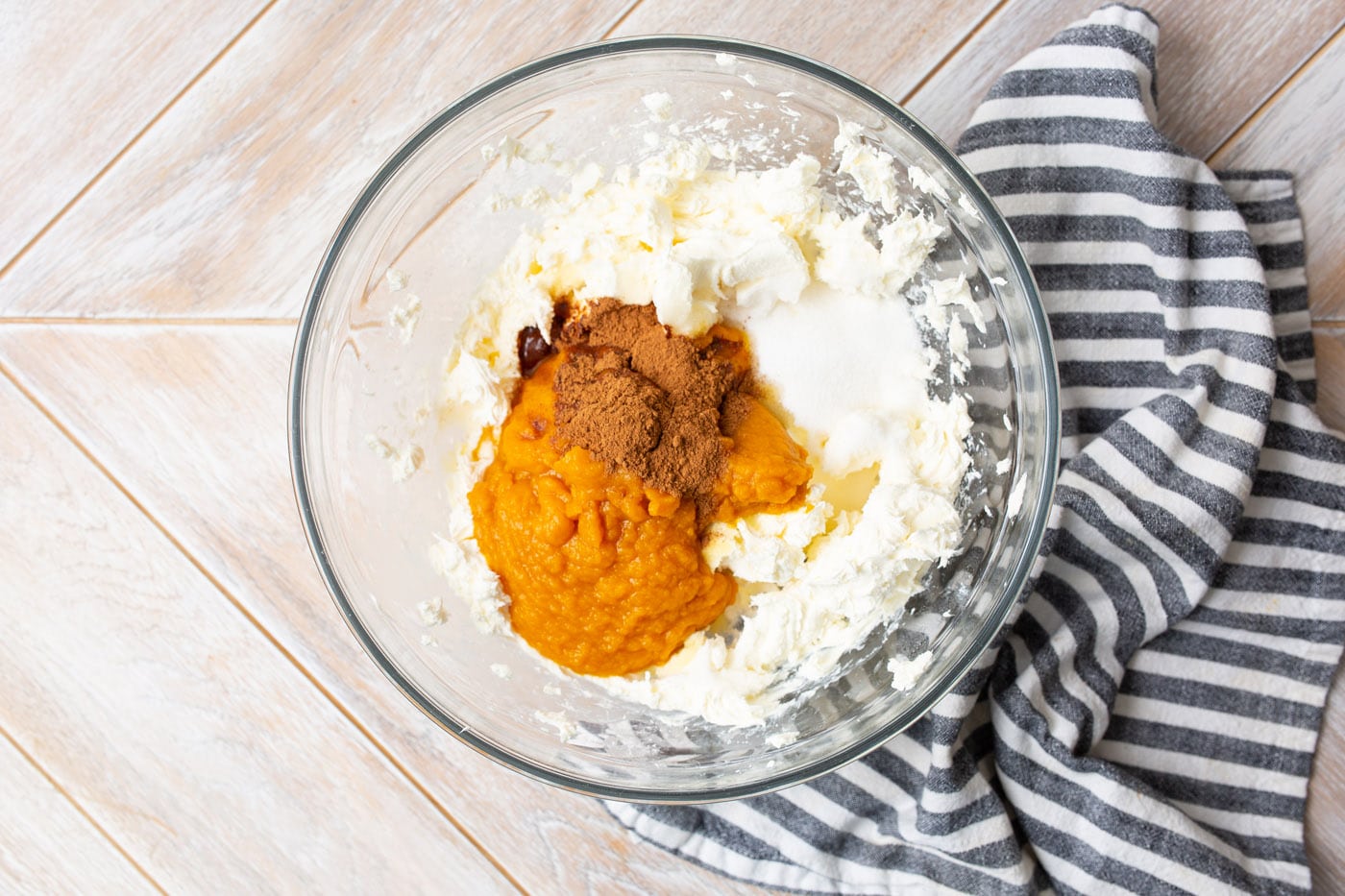 cream cheese, pumpkin puree, pie spice and vanilla in a mixing bowl