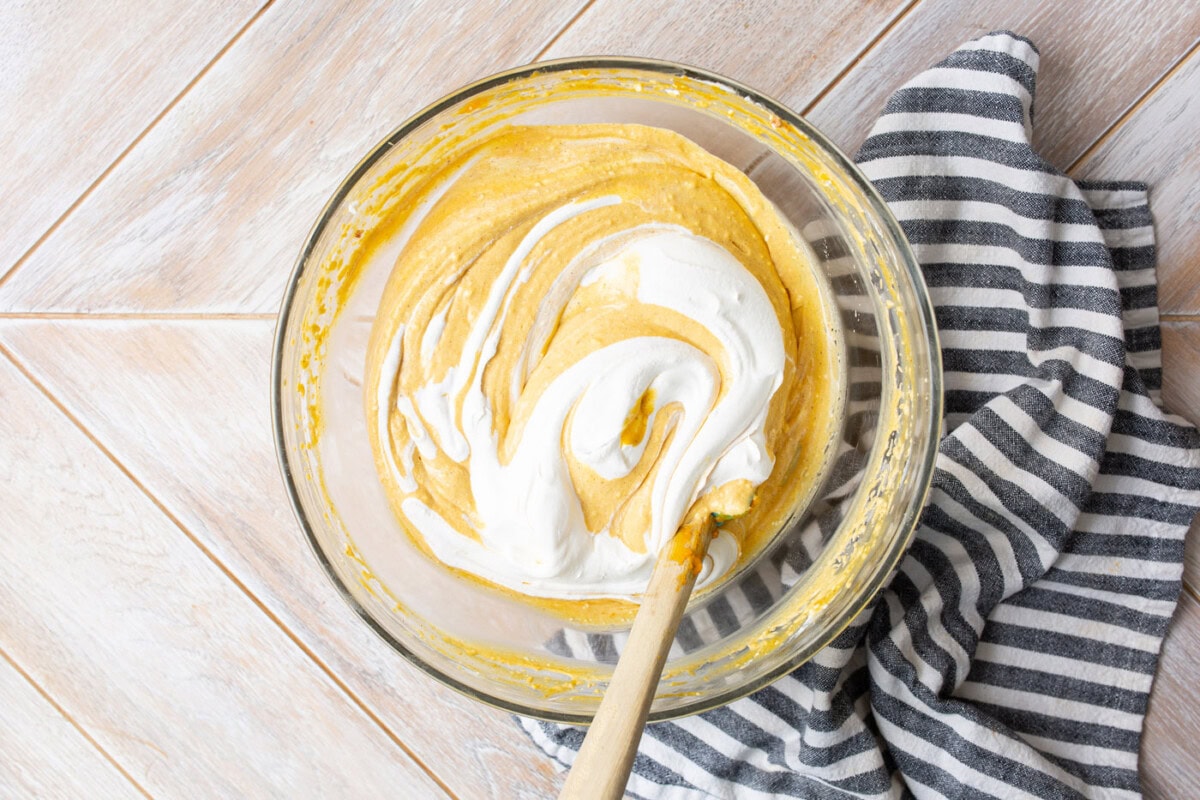 whipped topping stirred into pumpkin cheesecake