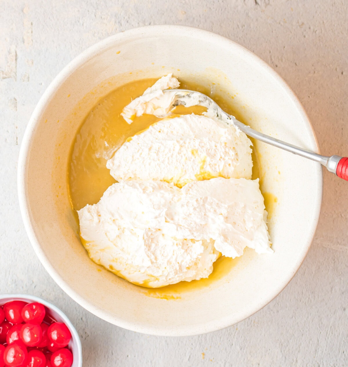 folding in cool whip to root beer pie mixture
