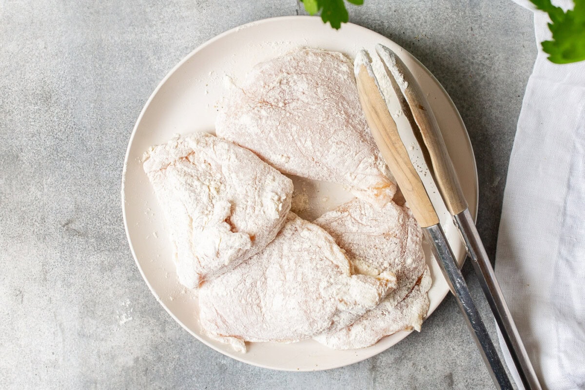 flour coated chicken breasts