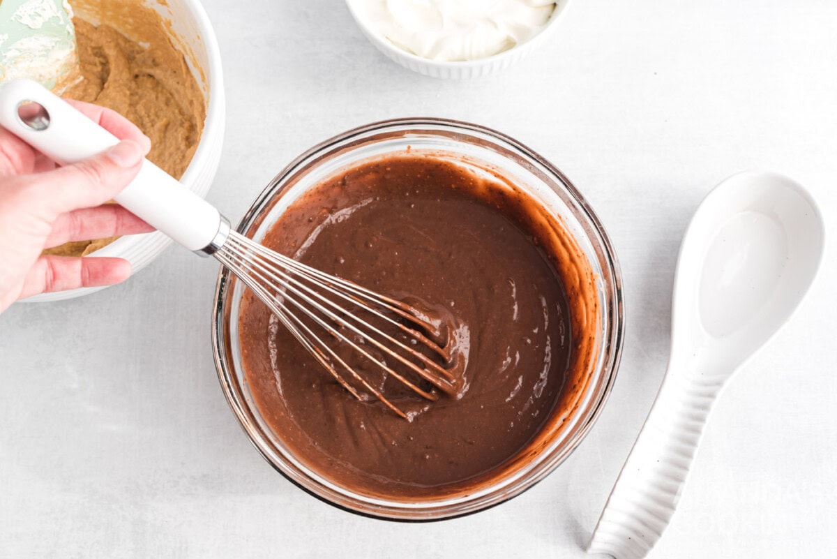 whisking instant pudding in a bowl