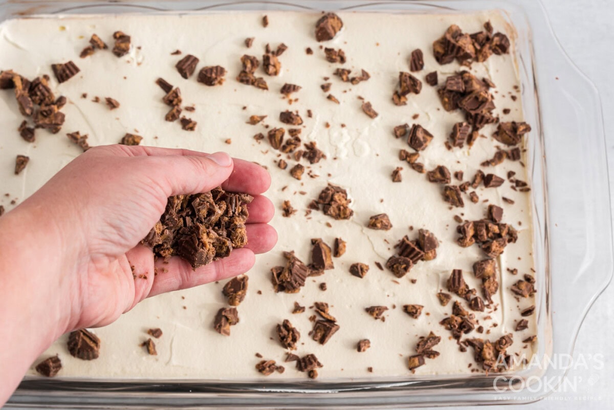 sprinkling chopped Reese's cups on top of dessert