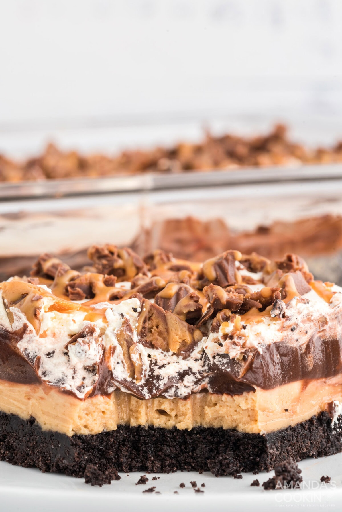 Chocolate Peanut Butter Lasagna with a bite removed