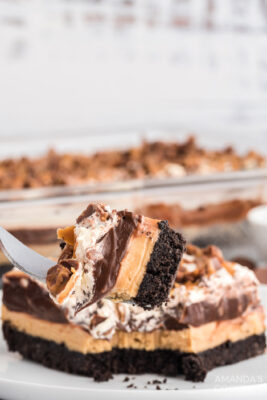 Chocolate Peanut Butter Lasagna - Amanda's Cookin' - One Pan Desserts