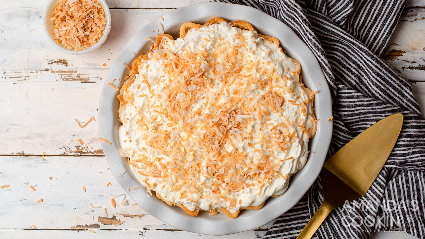 Coconut cream pie is a light dessert full of silky smooth coconut custard and a topping of whipped c