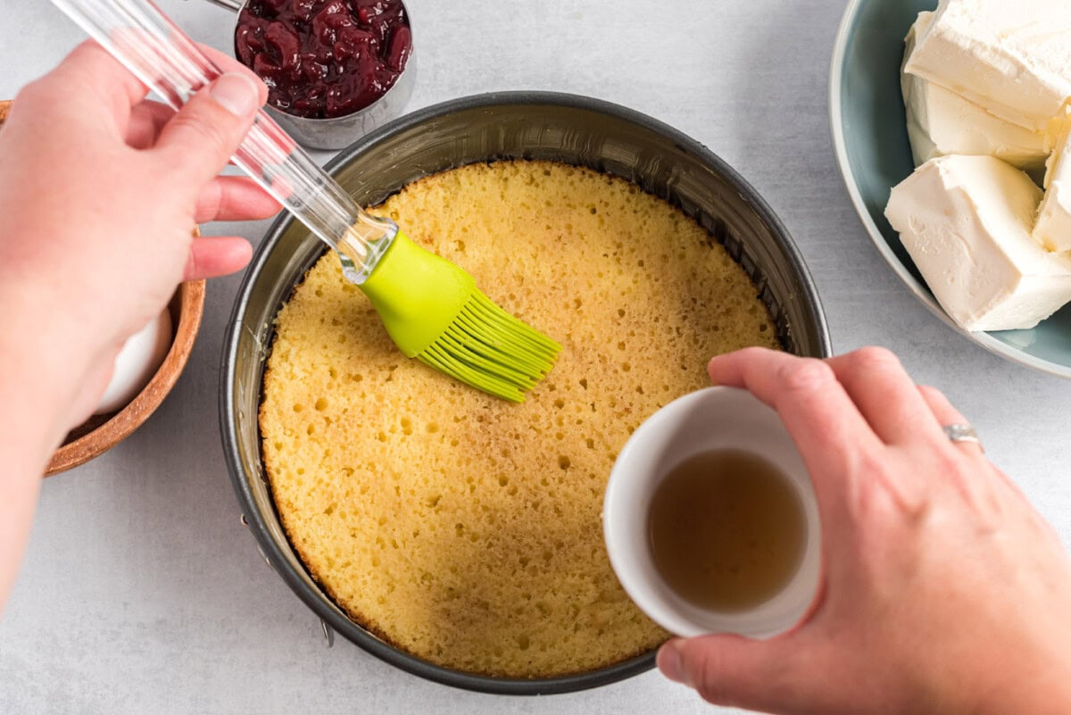 brushing cake with sherry