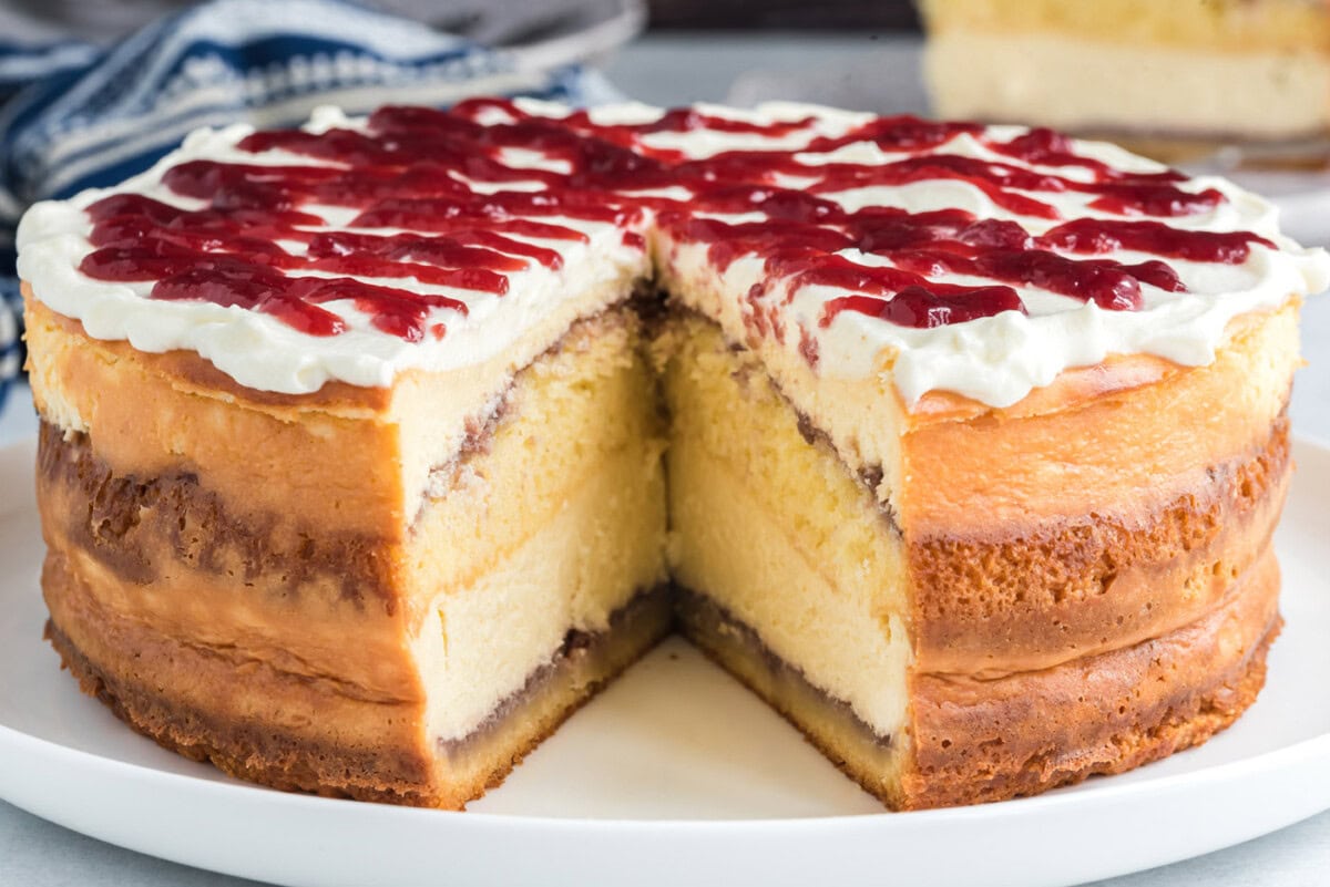 English Trifle Cheesecake with a slice removed