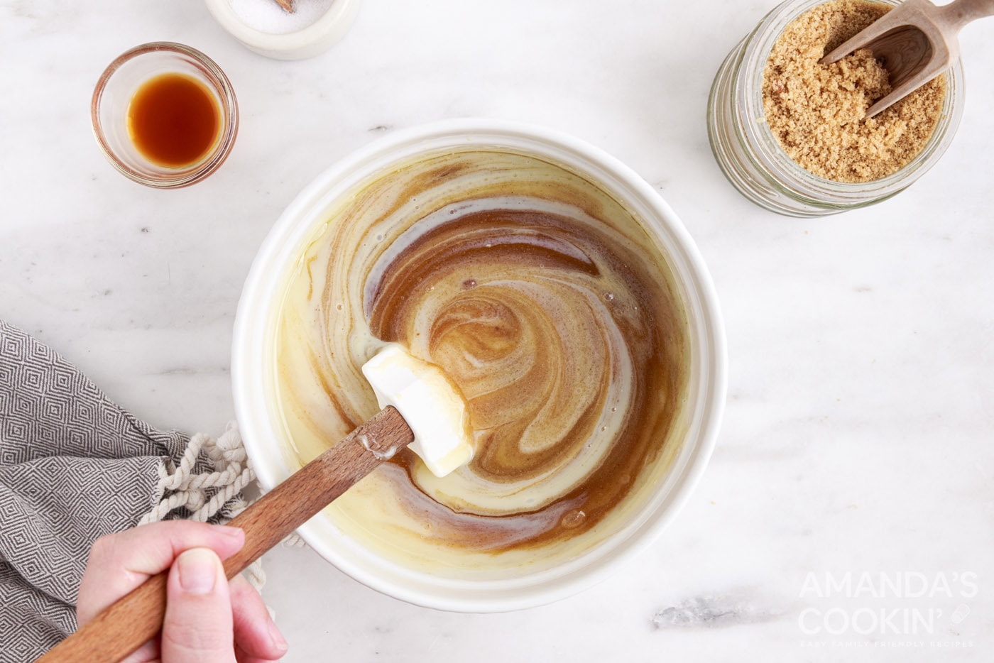 sweetened condensed milk in a bowl of caramel