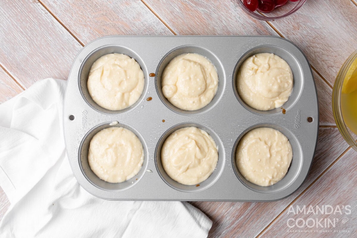 cake batter in a jumbo muffin tin