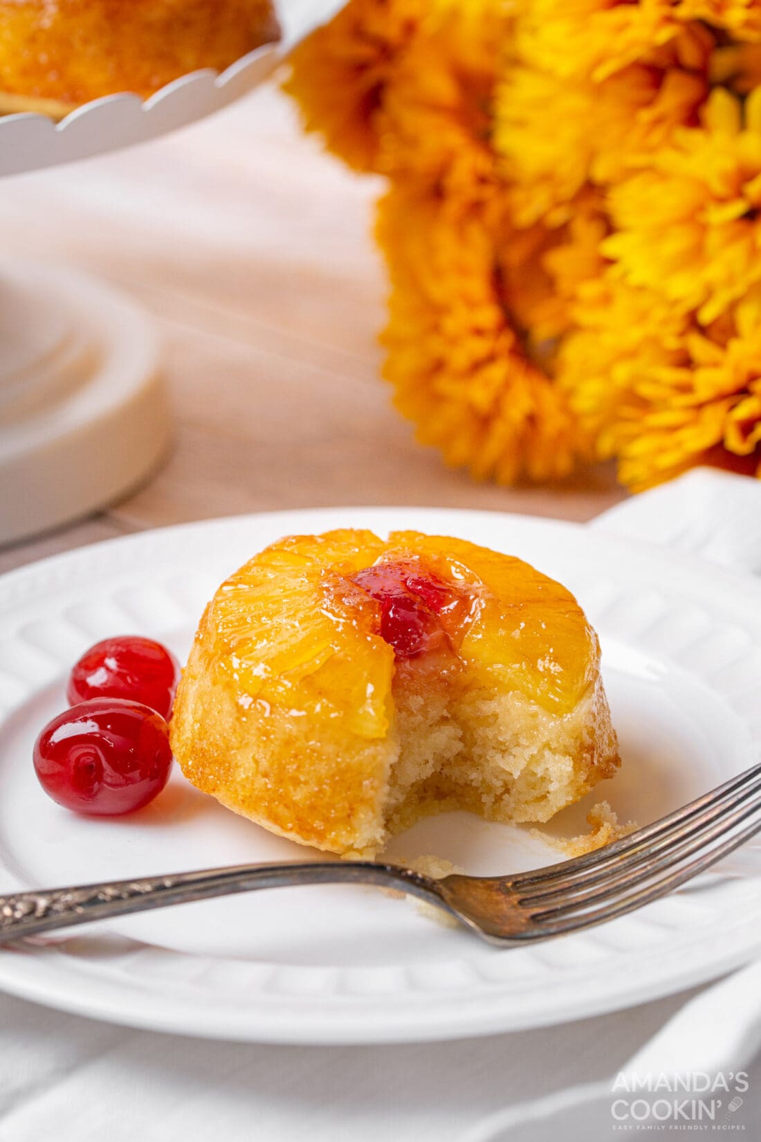 Mini Pineapple Upside Down Cake with a bite out of it