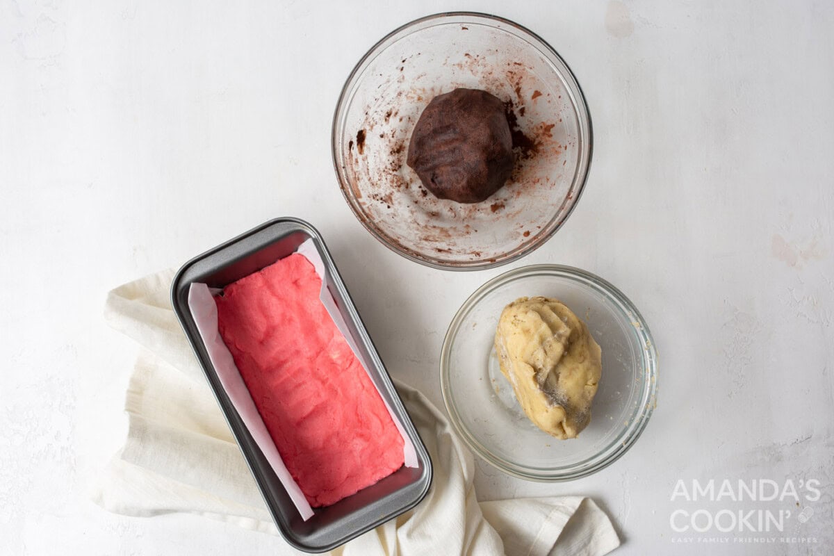 pink cookie dough in a loaf pan