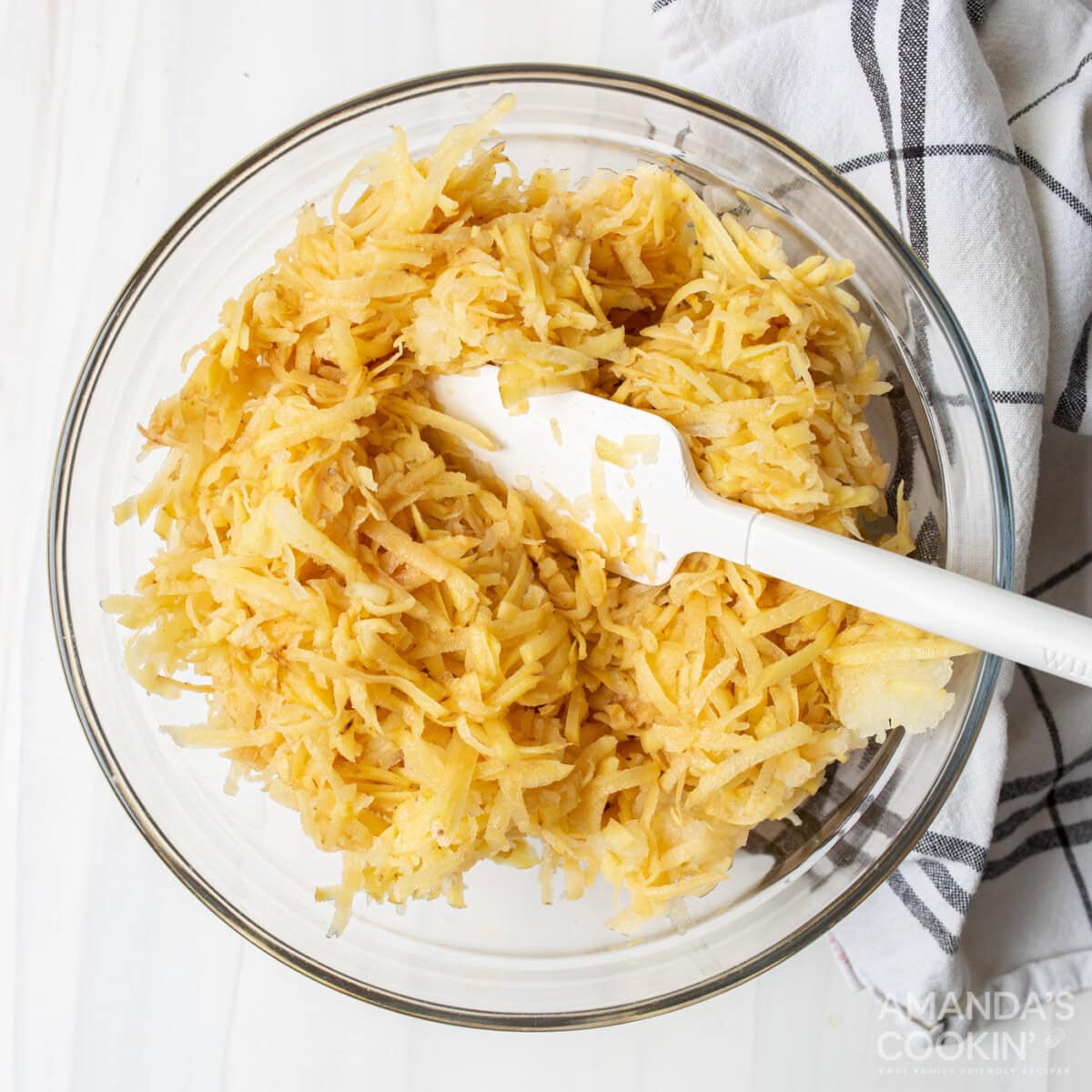 grated potatoes in a bowl