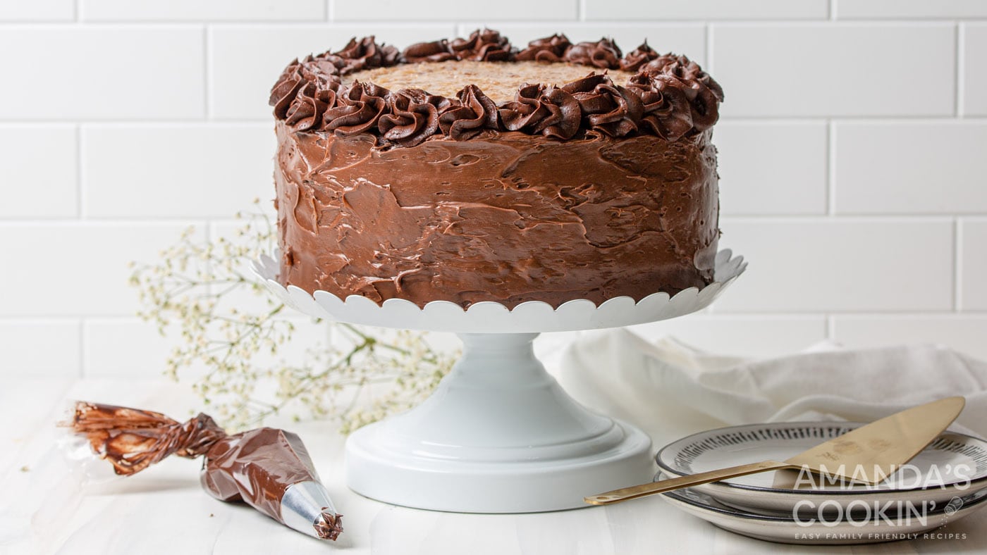 This gorgeous tiered German chocolate cake is swoon-worthy. Coconut pecan filling provides a delicat