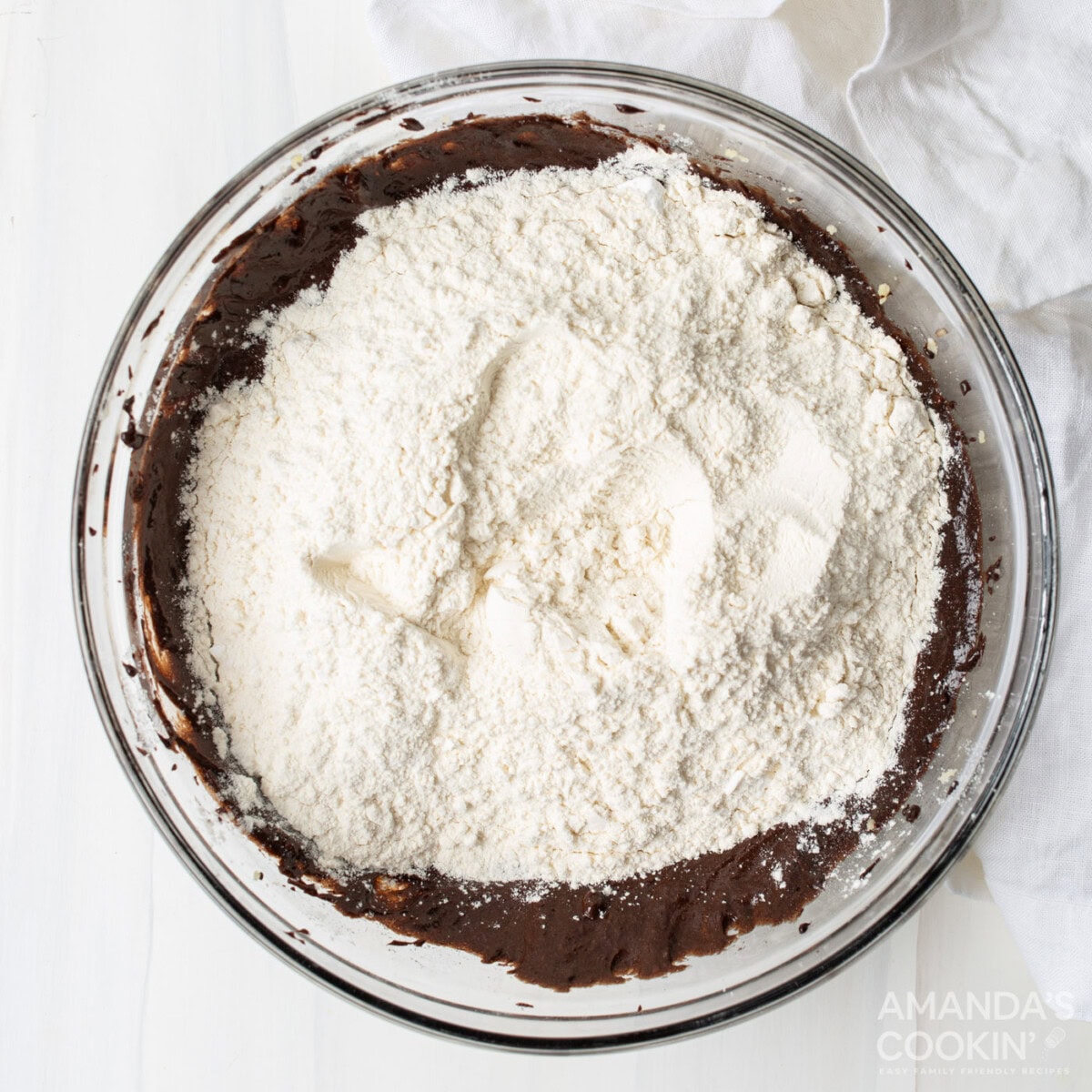 flour in a bowl of chocolate