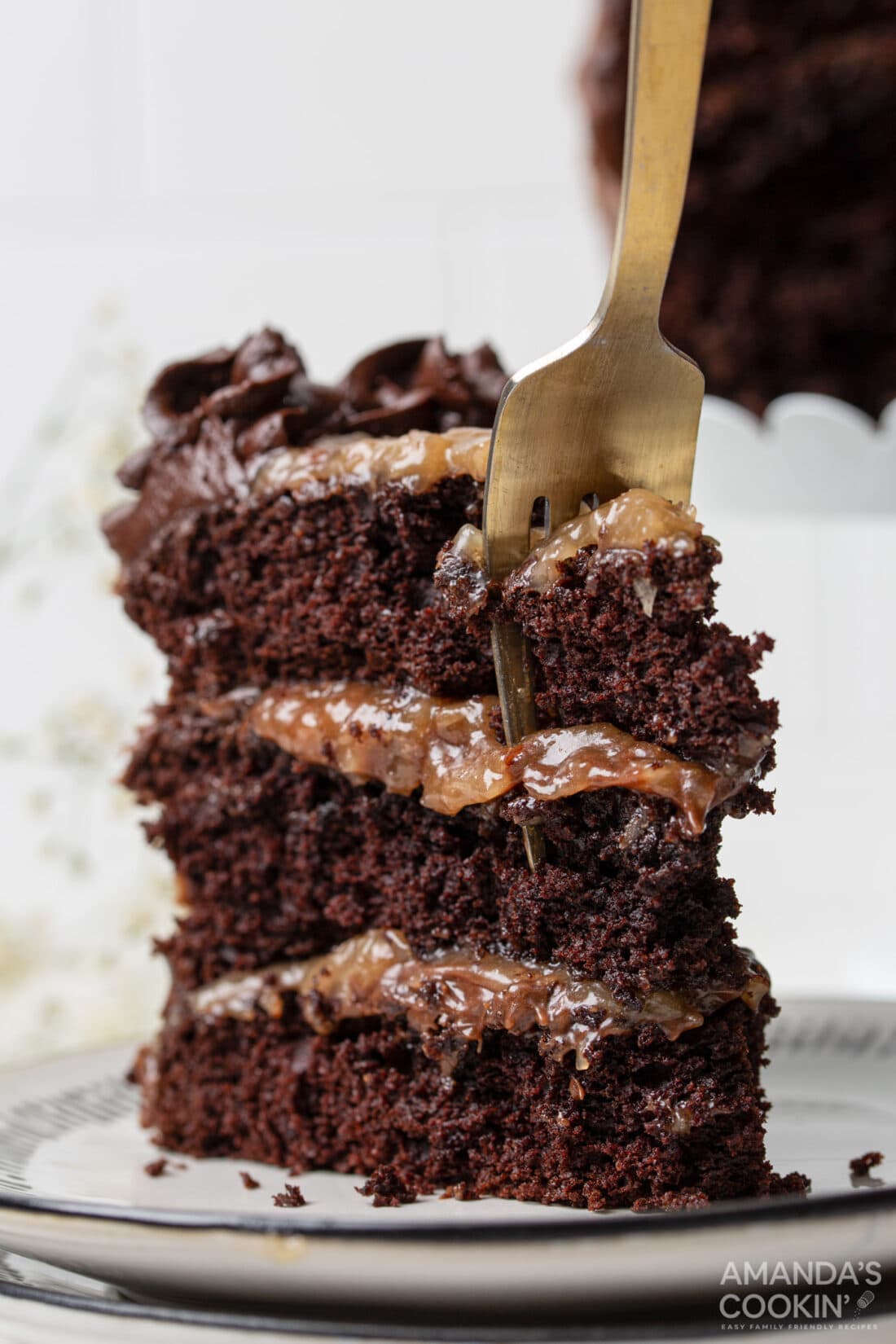 fork in a slice of German Chocolate Cake
