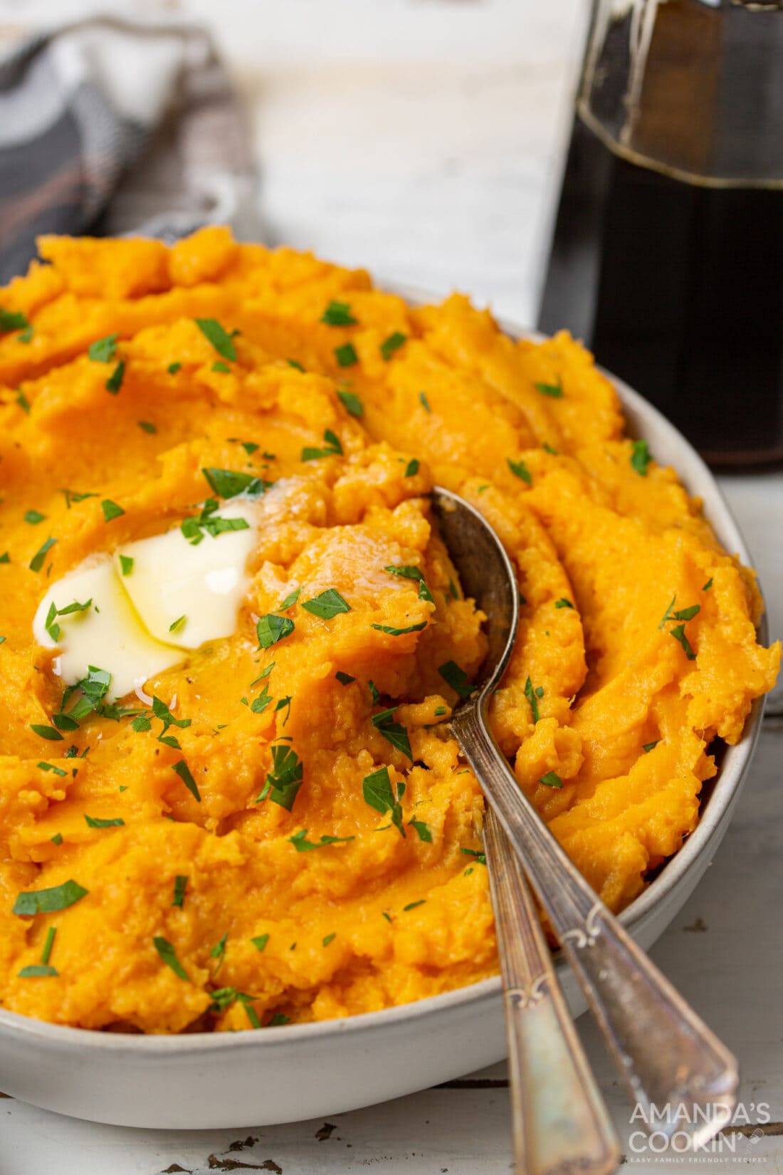 bowl of Mashed Sweet Potatoes with spoon