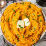 overhead view of a bowl of Mashed Sweet Potatoes