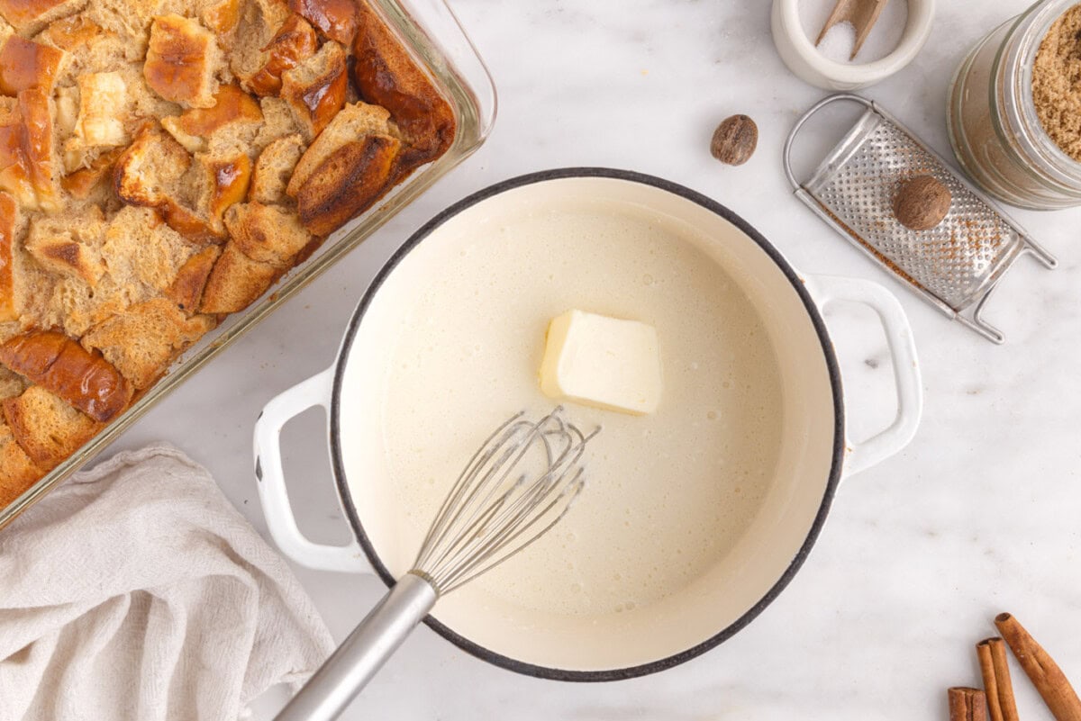 whisking in butter into vanilla sauce