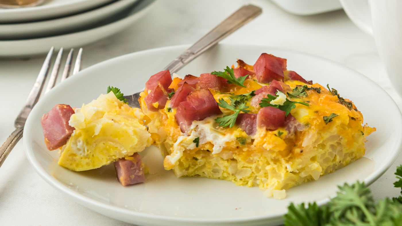 This easy breakfast casserole with ham, cheese, and potatoes is a fulfilling way to start the day.