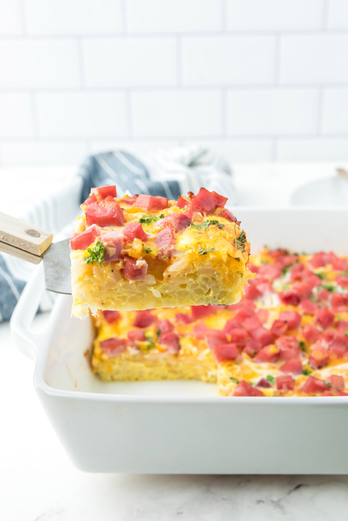 spatula lifting a serving of Breakfast casserole