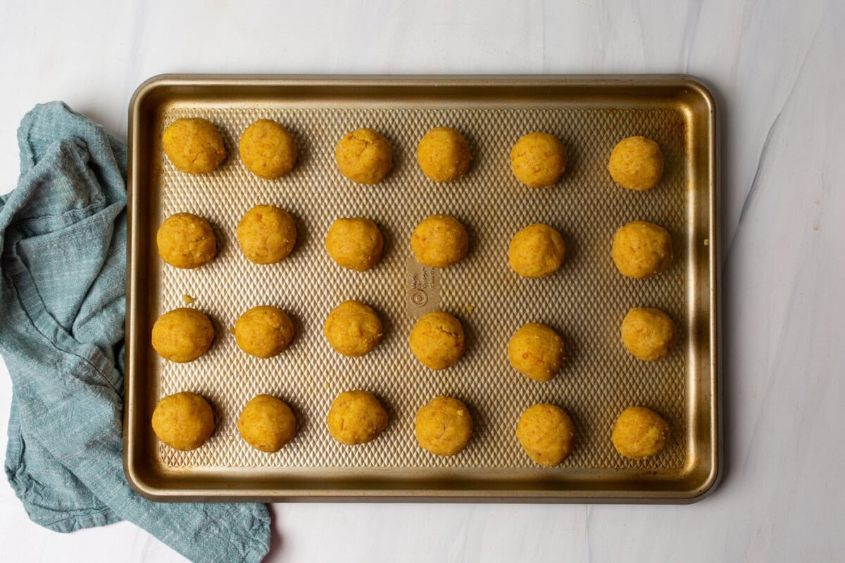 cake balls on a baking sheet