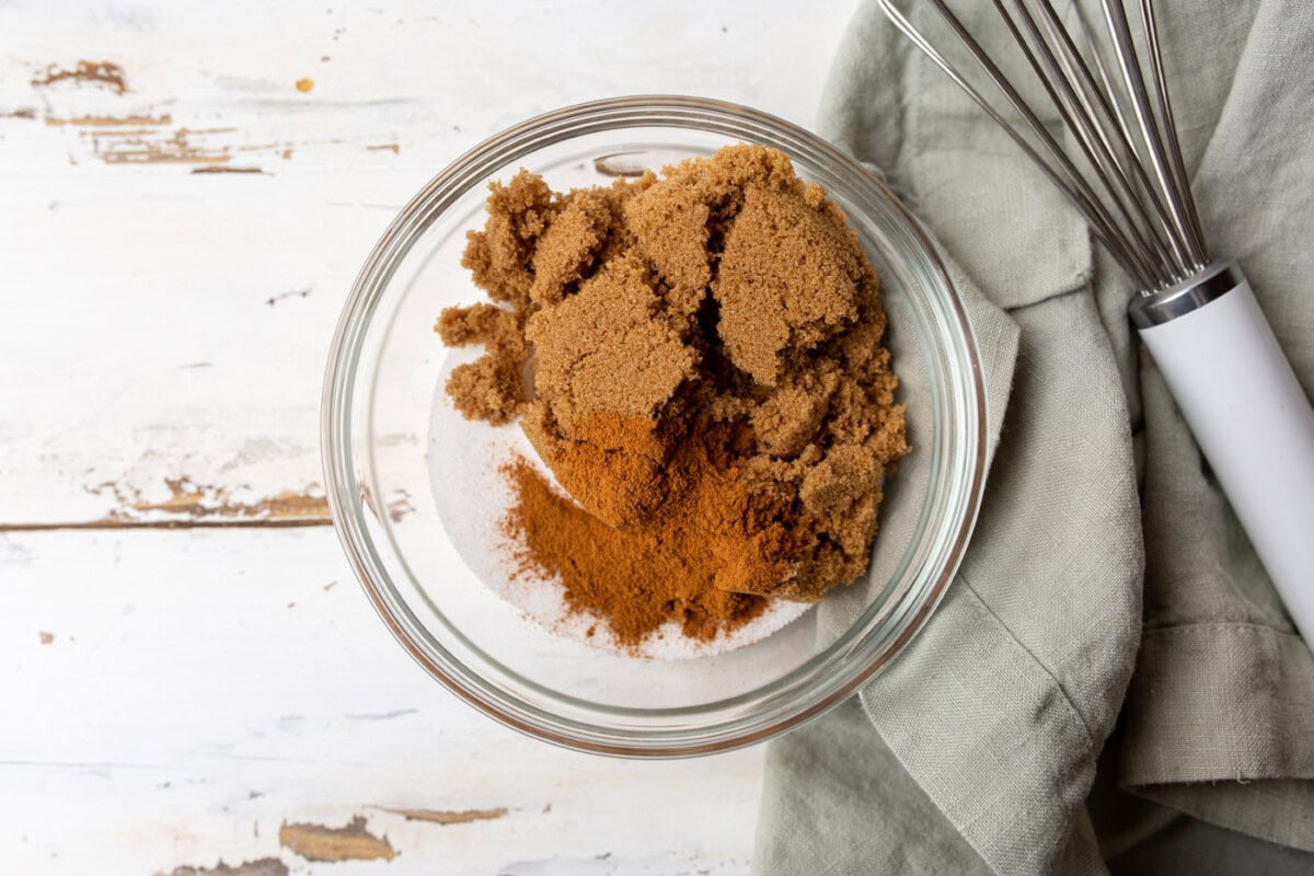 brown and white sugar with cinnamon in a bowl