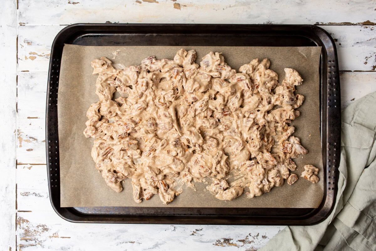candied pecans on a baking sheet