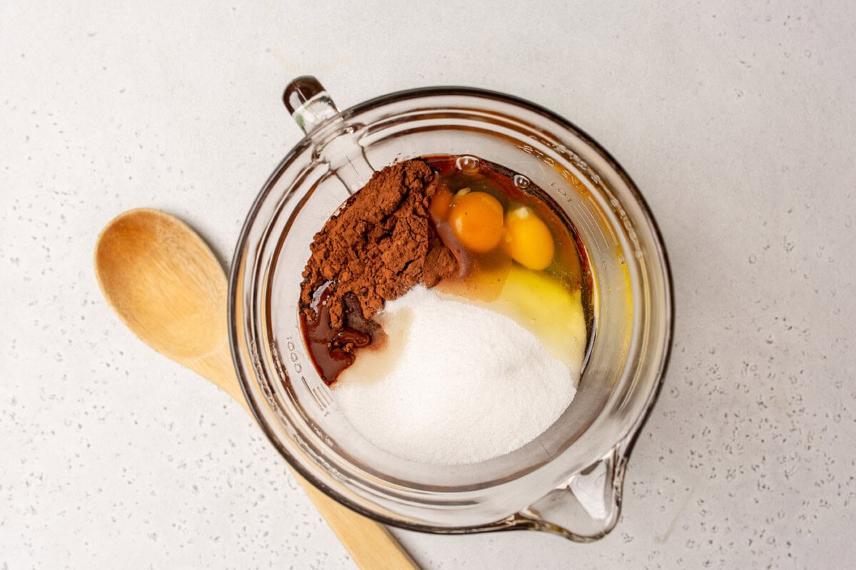 melted chocolate, eggs, cocoa powder, sugar, and extract