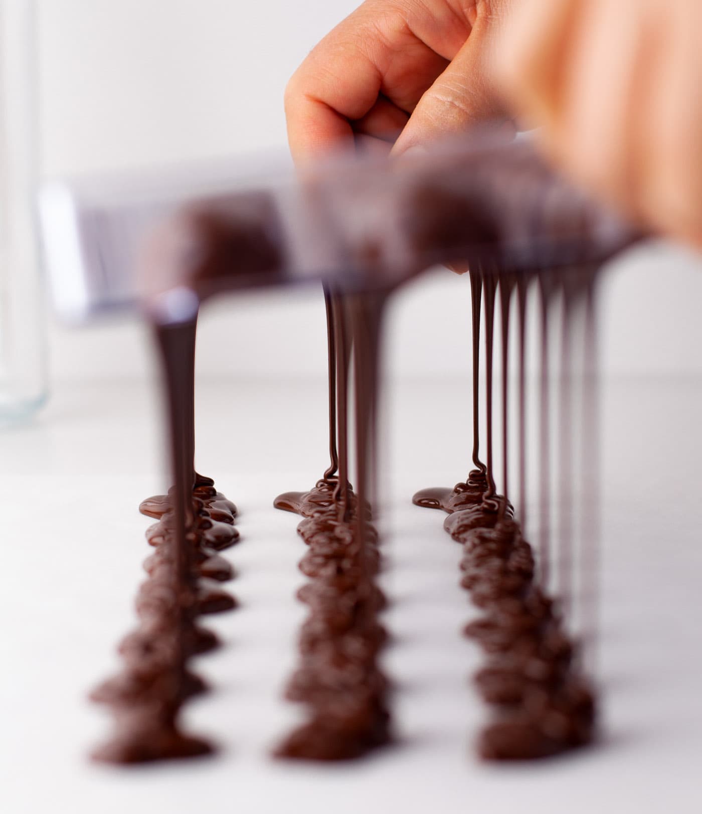chocolate dripping out of candy mold