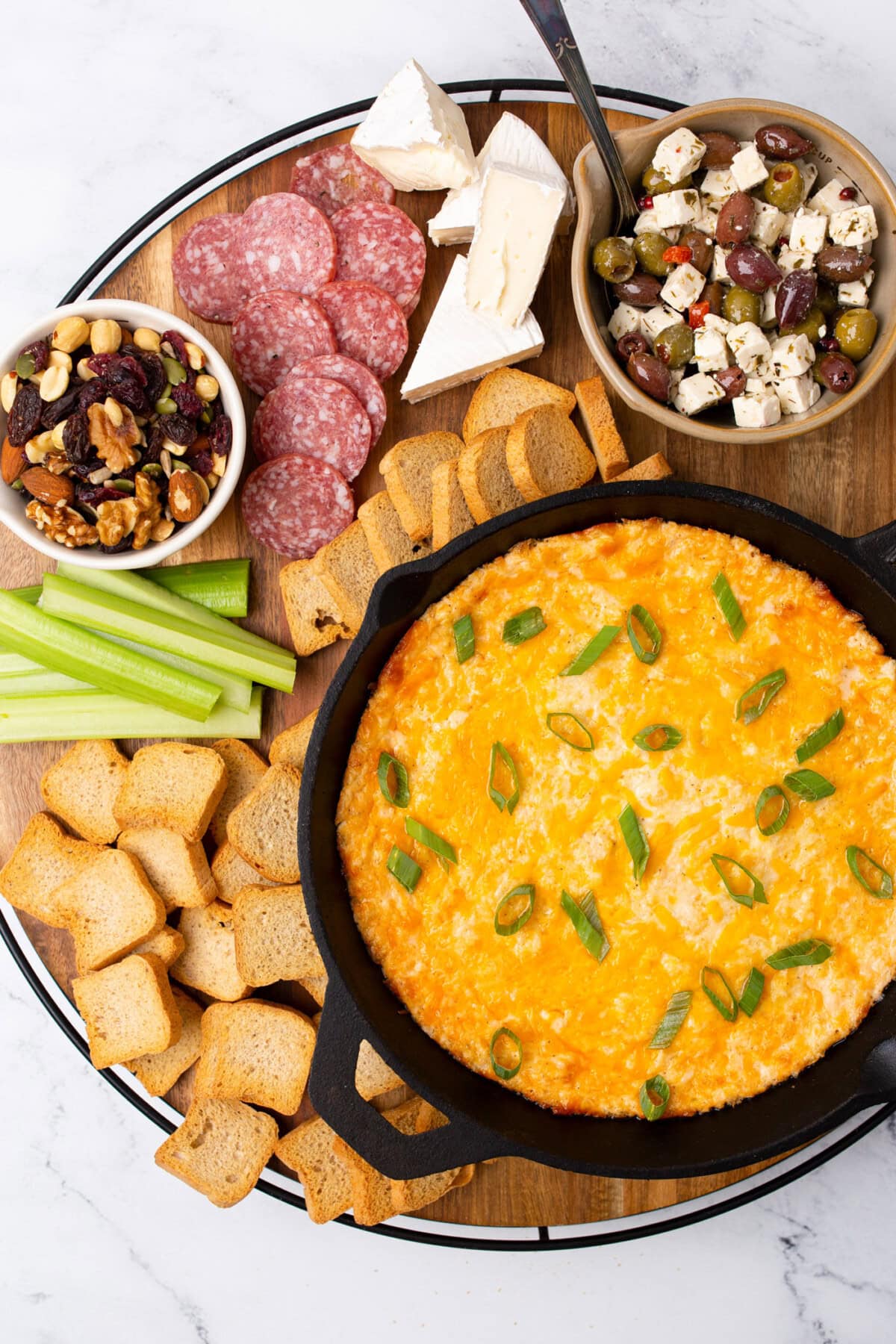 Crab Dip on a board with meat and cheese