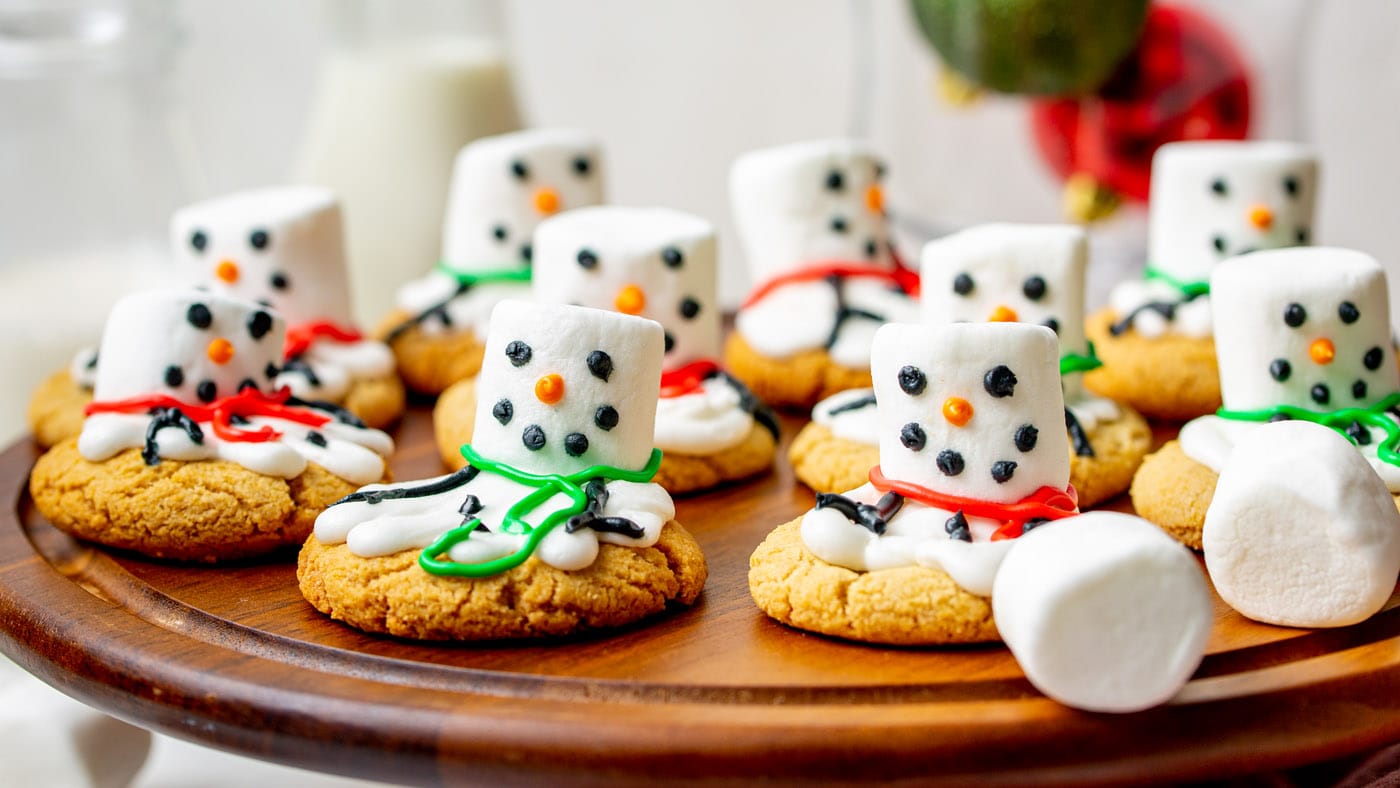 Bring these sweet melted snowman cookies with you to a cookie exchange, give them as gifts, or make 