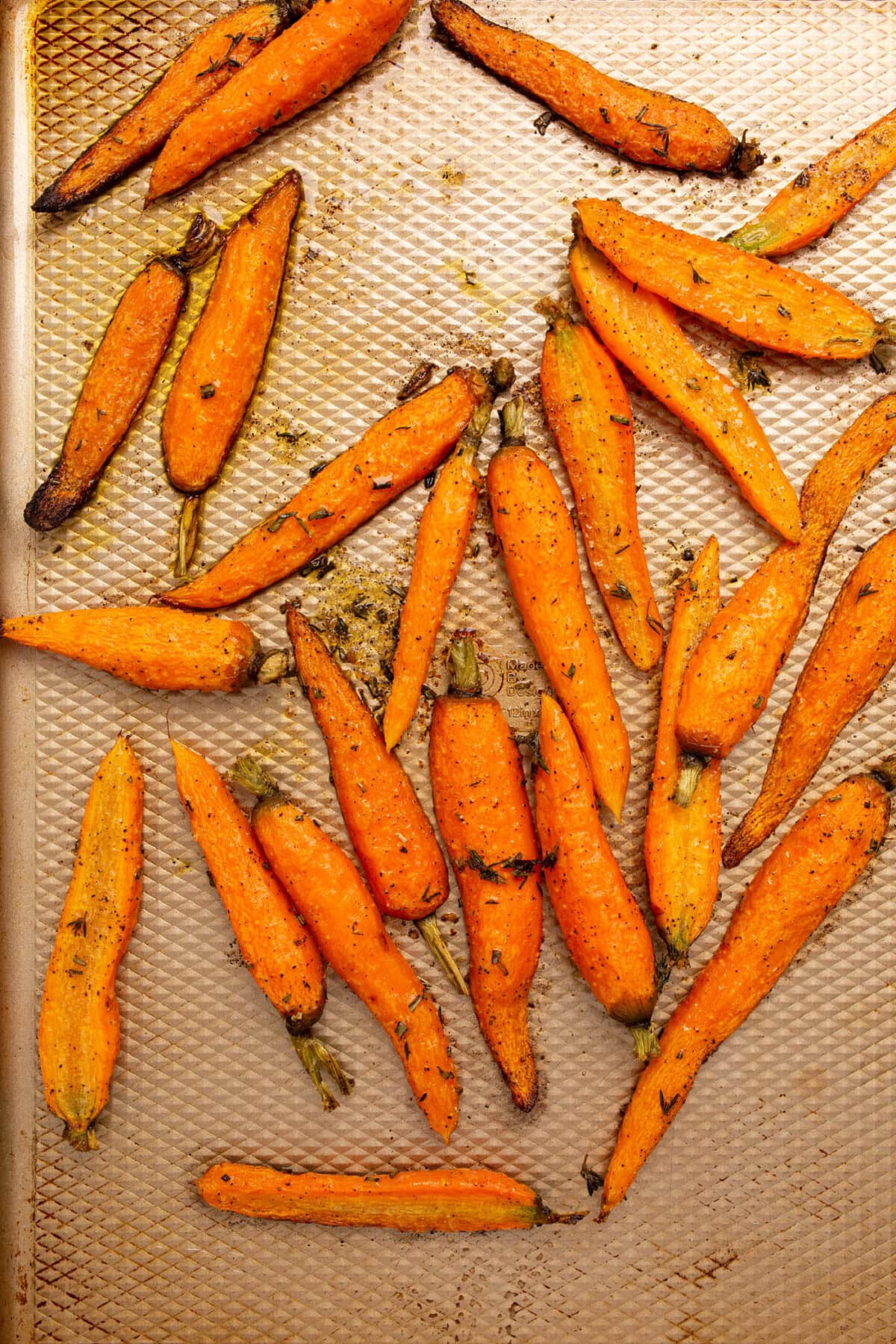 roasted carrots on a baking sheet