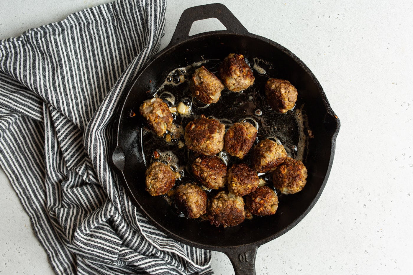browned swedish meatballs in a skillet