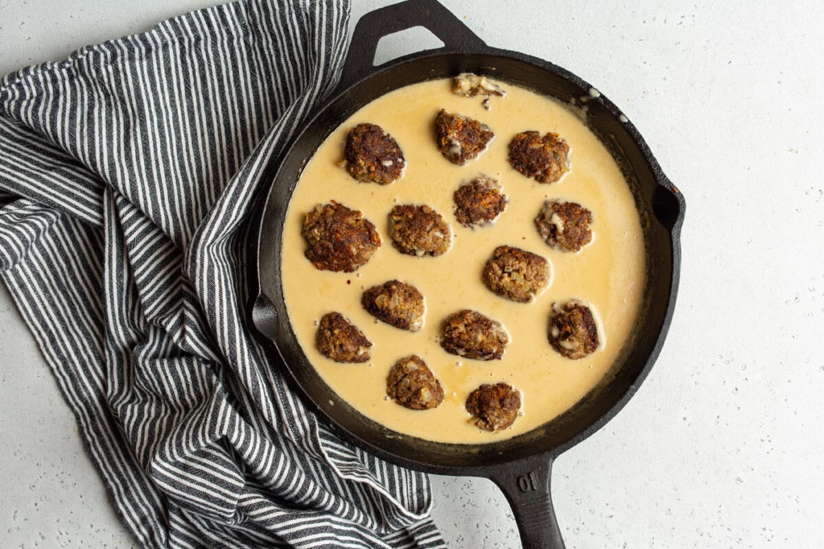 meatballs in gravy sauce in skillet