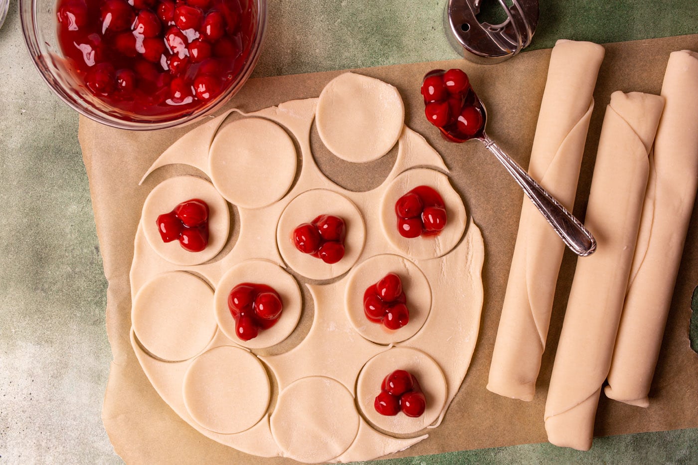 cherry pie filling in circles of pie dough